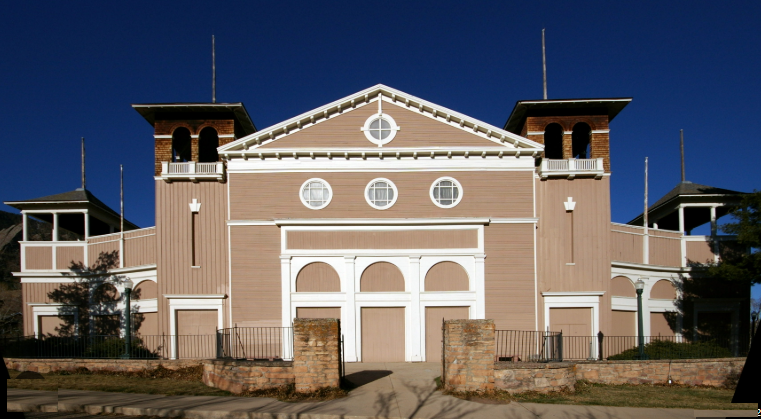 Chautauqua Auditorium in Boulder, Colorado — the 1898 wooden auditorium's front elevation with twin Victorian belltowers and arched entrance arcade