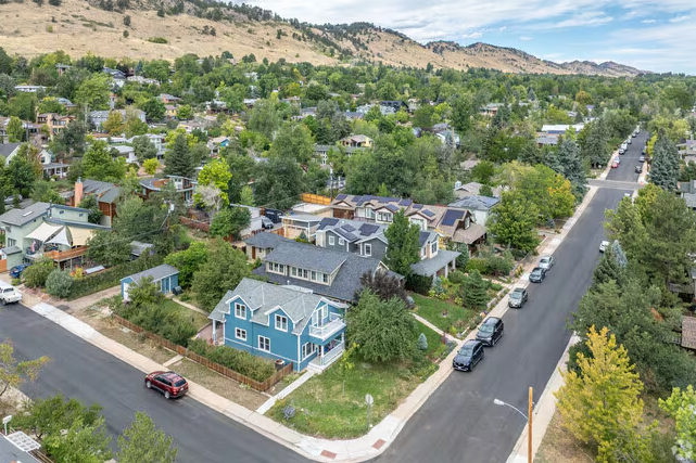 Newlands neighborhood in north-central Boulder, Colorado — aerial view showing residential streets backed by the Mt. Sanitas foothills